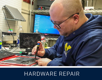 text reads hardware repair with photo of technician using tools on an open device